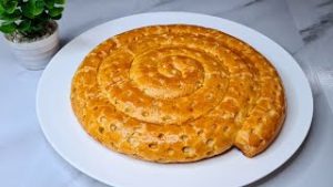 فطيرة التفاح الحلزونية: الوصفة التي لا يعرفها الكثير! 🍎✨